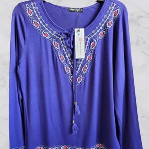 Urban coco tassel tie embroidered top